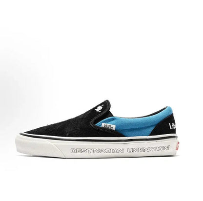Vans Slip-On sneakers, black canvas with blue lining and white sole, 'Destination Unknown'