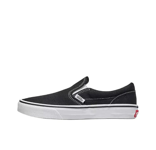 Vans Slip On black canvas sneakers with elastic gore and padded collar, side view.