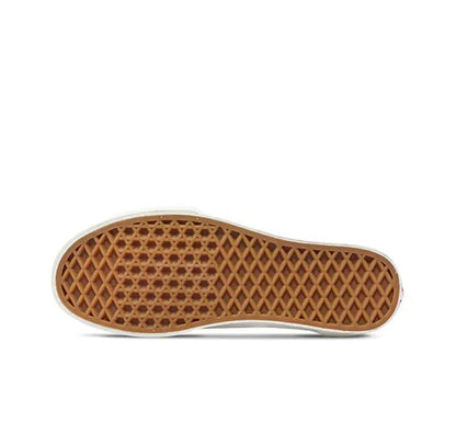 Vans Slip On outsole, brown tread on white rubber base