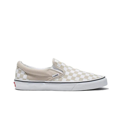 Vans Slip-On shoe side view in beige and white checker canvas with white sole.
