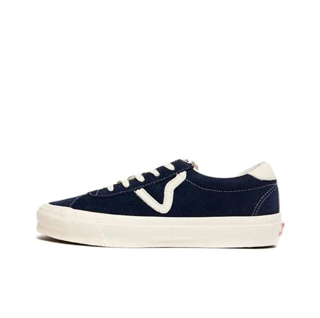 Navy low-top sneakers with white V logo, cream sole, and lace-up front