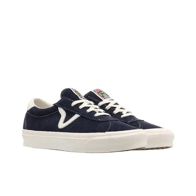 Navy low-top lace-up sneakers with white V logo and canvas uppers