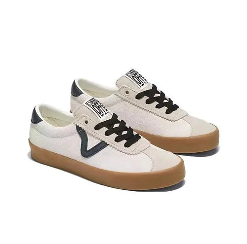 Vans low-top sneakers in beige/white with black laces, navy side stripe, gum sole