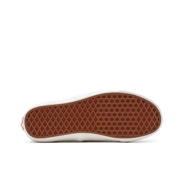 Vans checkerboard sneakers outsole, textured brown rubber with white sidewall