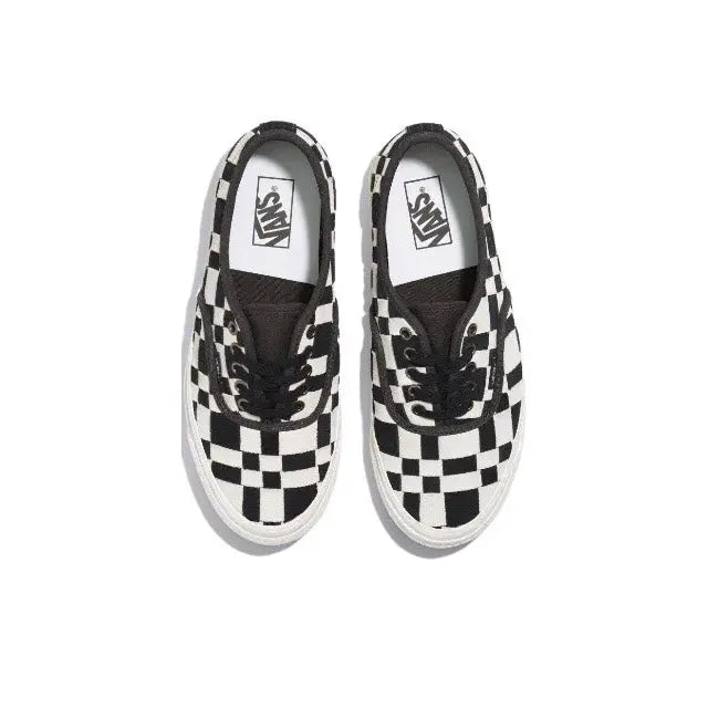 Vans checkerboard sneakers, white canvas with black pattern and lace area