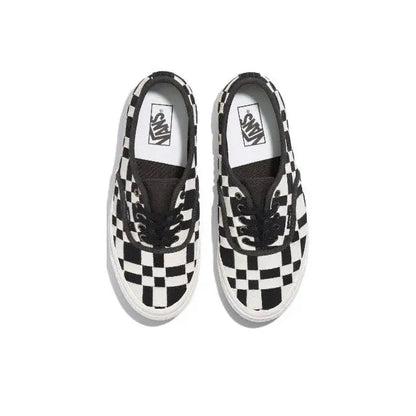 Vans checkerboard sneakers, white canvas with black pattern and lace area