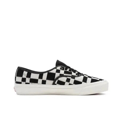 Vans checkerboard sneakers in white and black with white rubber sole