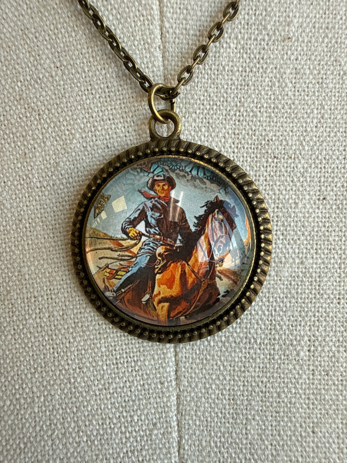 Vintage cowboy glass pendant necklace with round bezel, cowboy scene, antique gold chain