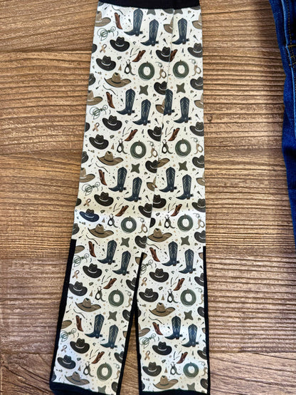 Trouser socks with tall black cuff and repeating western icons on white fabric