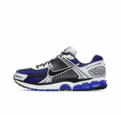 Zoom Vomero 5 SP sneaker in white, blue and black with Swoosh and lace-up front