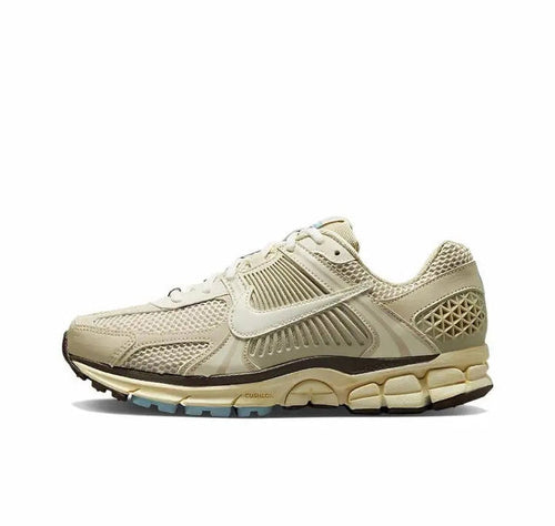 Oatmeal lace-up running sneakers with Nike swoosh and chunky rubber sole