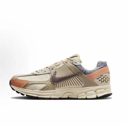 Nike Zoom Vomero 5 SP sneaker in sand with rust and dark blue accents, lace-up