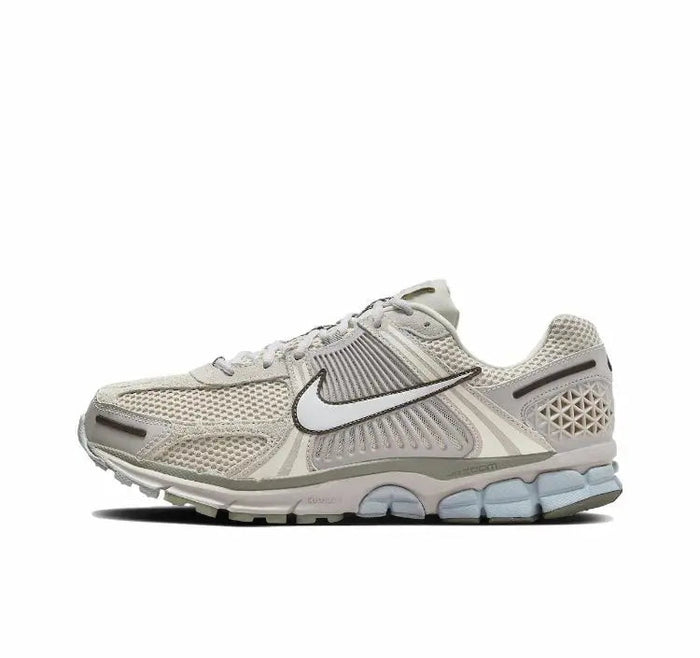 Nike Zoom Vomero 5 SP running shoe, light beige mesh with black swoosh