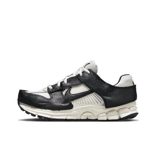 Nike Zoom Vomero 5 SP running shoe in black and sail with white midsole, lace-up