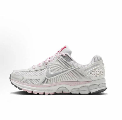 Nike Zoom Vomero 5 SP running shoe, white with pink accents, side view