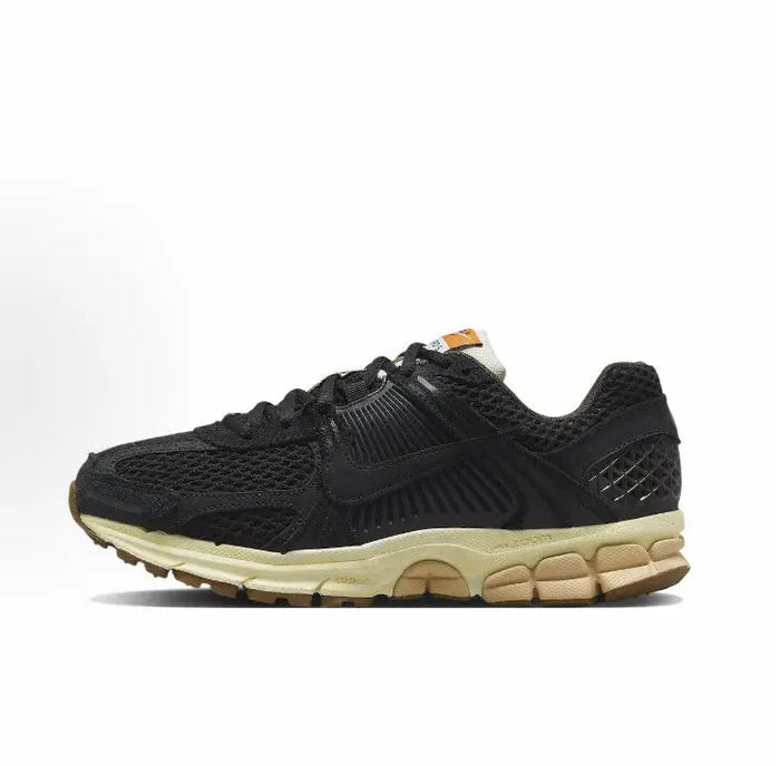 Nike Zoom Vomero 5 SP running shoe, black mesh upper with tan midsole