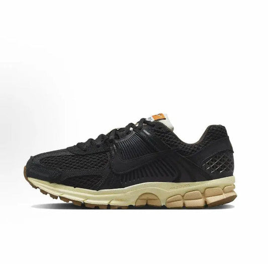 Nike Zoom Vomero 5 SP running shoe, black mesh upper with tan midsole