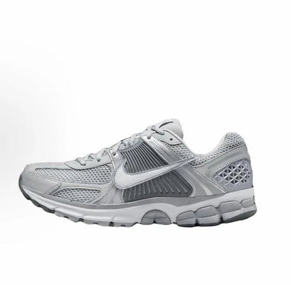 Nike Zoom Vomero 5 SP running shoe in light grey mesh with silver swoosh, lace-up