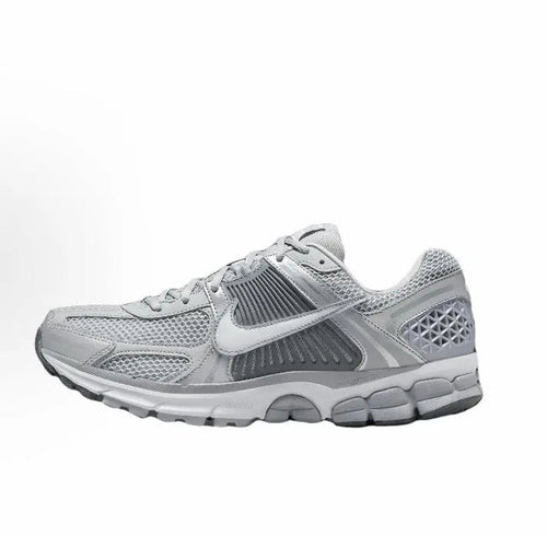 Nike Zoom Vomero 5 SP running shoe in light grey mesh with silver swoosh, lace-up