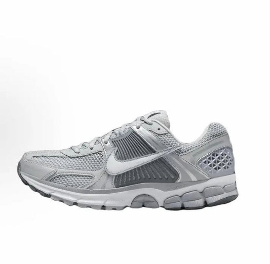 Nike Zoom Vomero 5 SP running shoe in light grey mesh with silver swoosh, lace-up