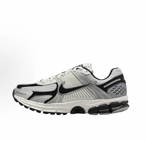 Nike Zoom Vomero 5 SP running sneaker in light gray and black, lace-up design