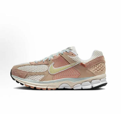 Nike Zoom Vomero 5 SP sneaker in tan, pink, and pale aqua with green swoosh