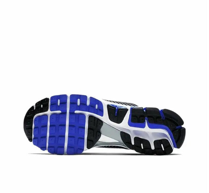 Zoom Vomero 5 SP shoe outsole in blue and black with tread pattern