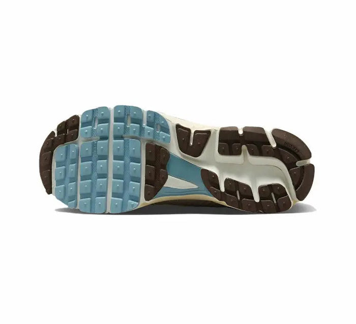 Nike running sneakers outsole with blue tread and dark rubber sections