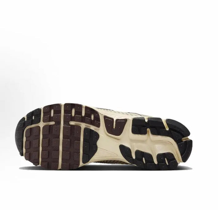 Nike Zoom Vomero 5 SP sneaker outsole with deep tread and grid traction pattern