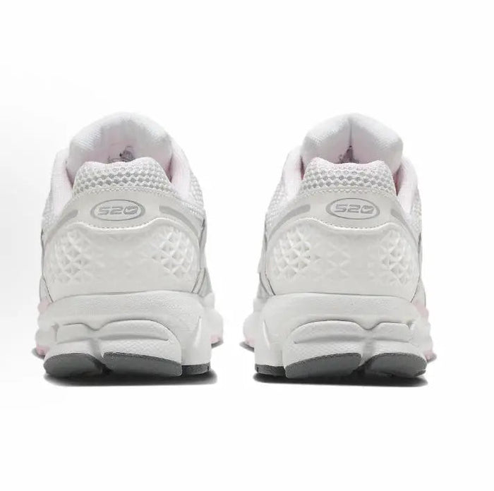 Running shoe, white with pink trim, heel view with S2D logo