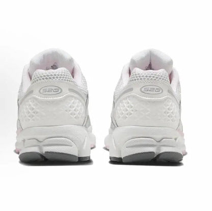 Running shoe, white with pink trim, heel view with S2D logo