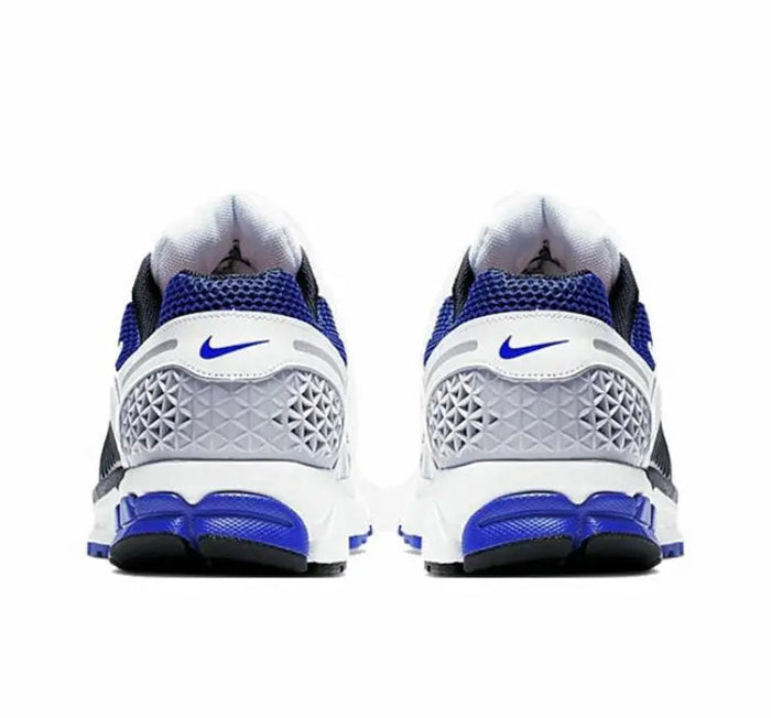 Zoom Vomero 5 SP sneaker heel view in white with blue accents and blue sole