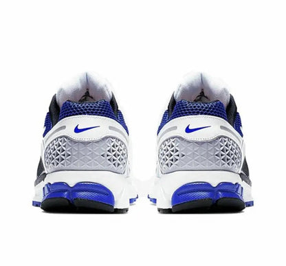 Zoom Vomero 5 SP sneaker heel view in white with blue accents and blue sole