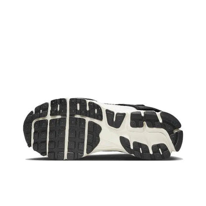 Nike Zoom Vomero 5 SP running shoe outsole with black tread and light midsole