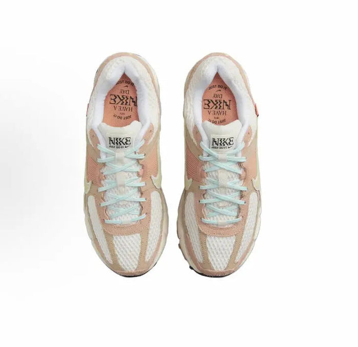 Nike Zoom Vomero 5 SP shoe pair showing laces and light interior lining