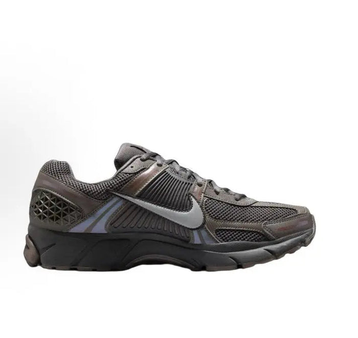 Running shoe side view in dark gray with silver stripe and padded collar